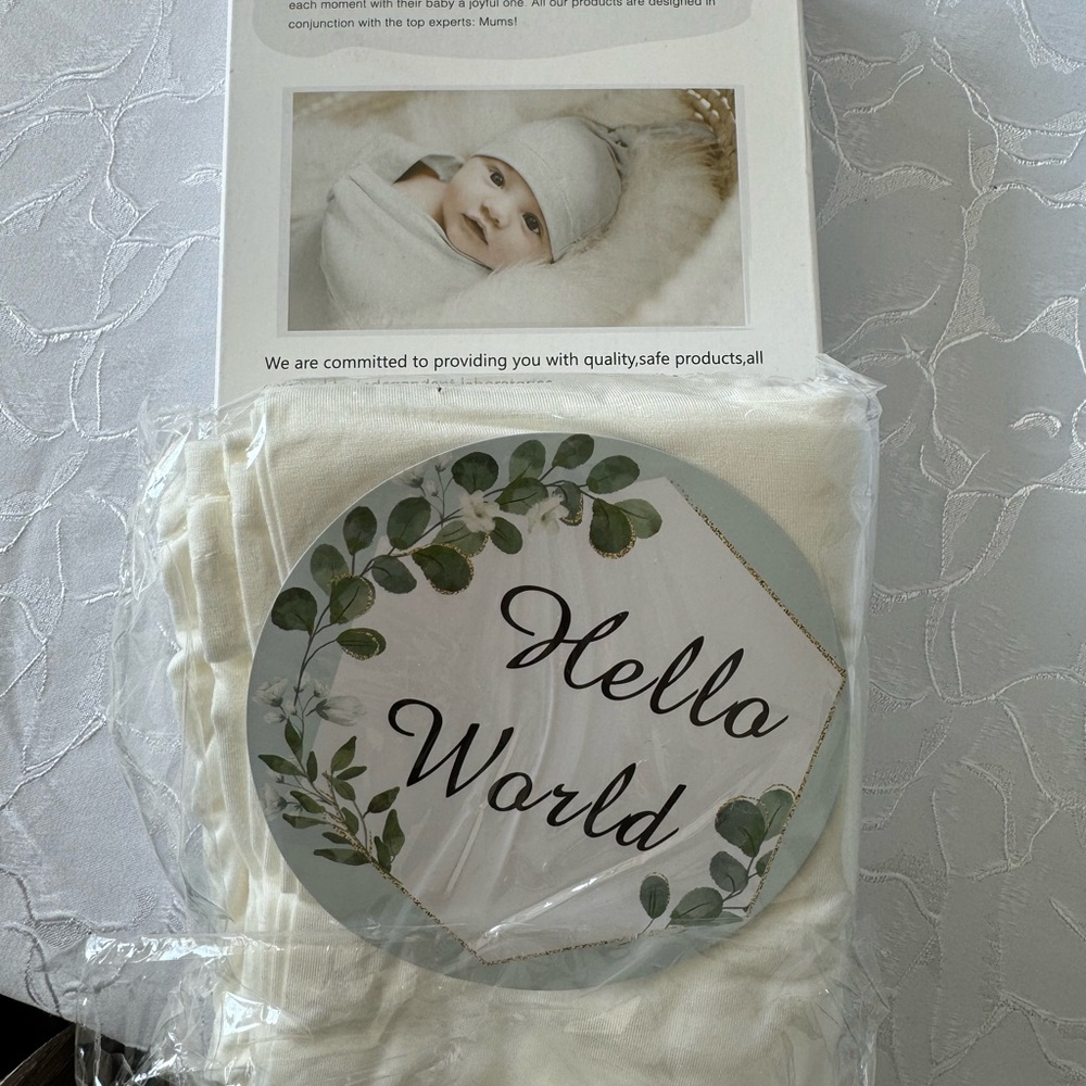 Newborn swaddle and hat